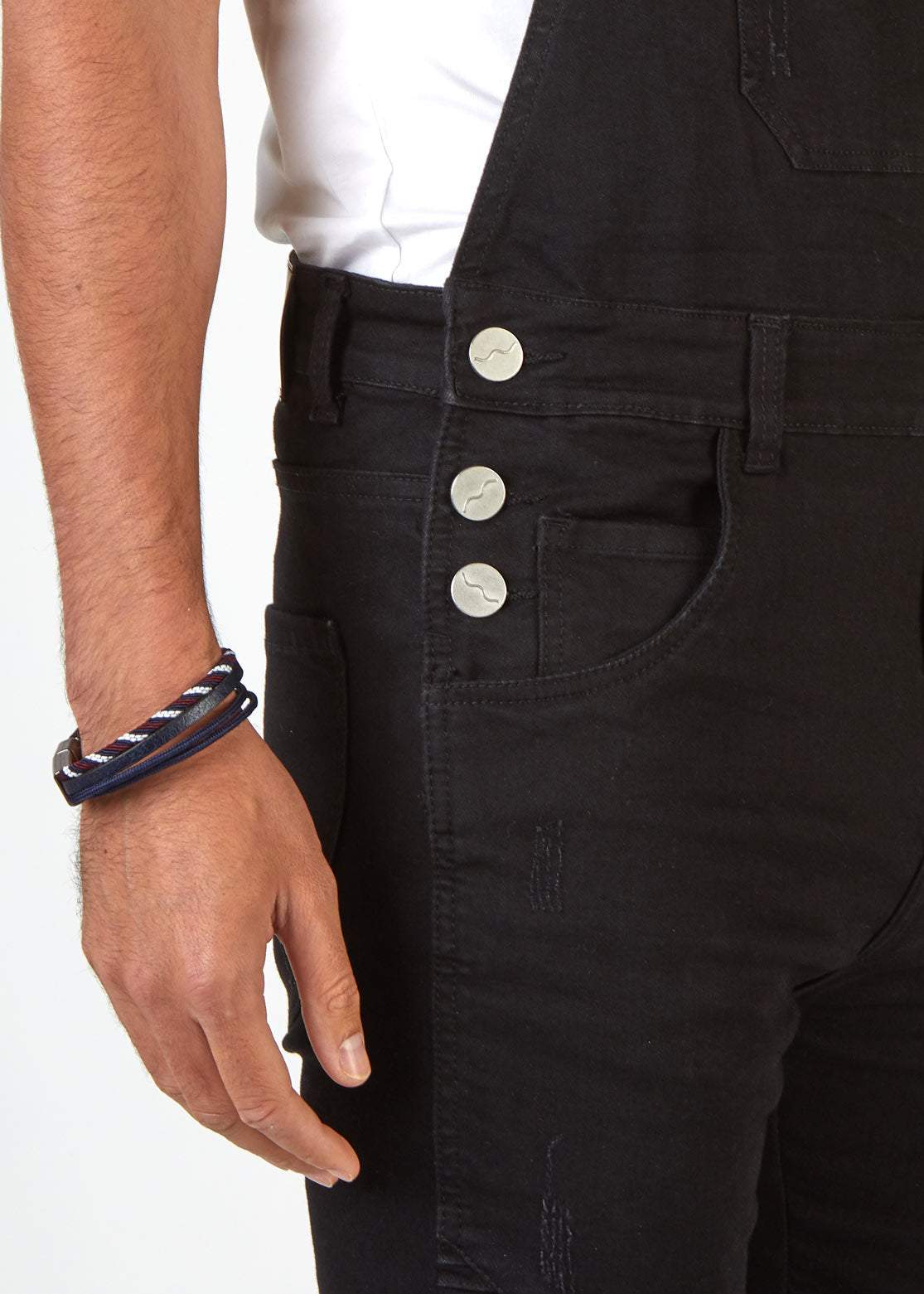 Close up shot of Trafford black slim fit dungaree shorts, side button fastening