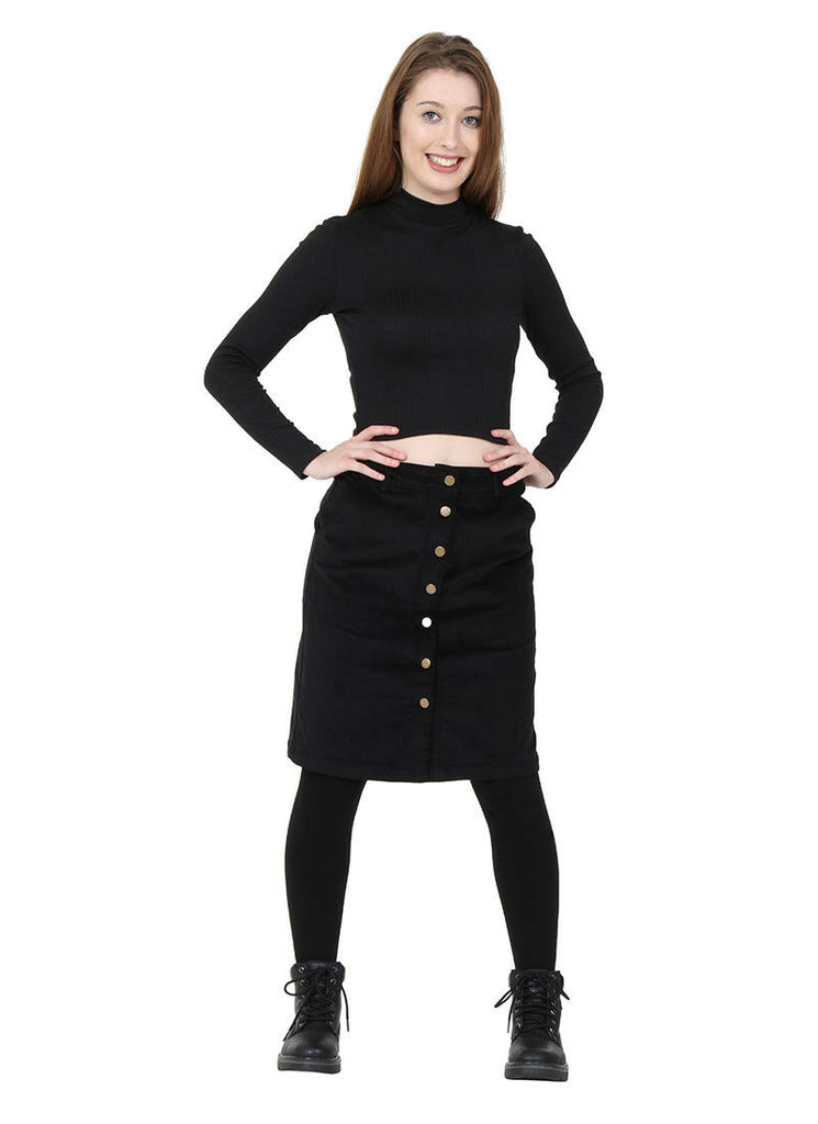 Full-length front view wearing Alice stretch black corduroy knee-length skirt with clear view of front buttons