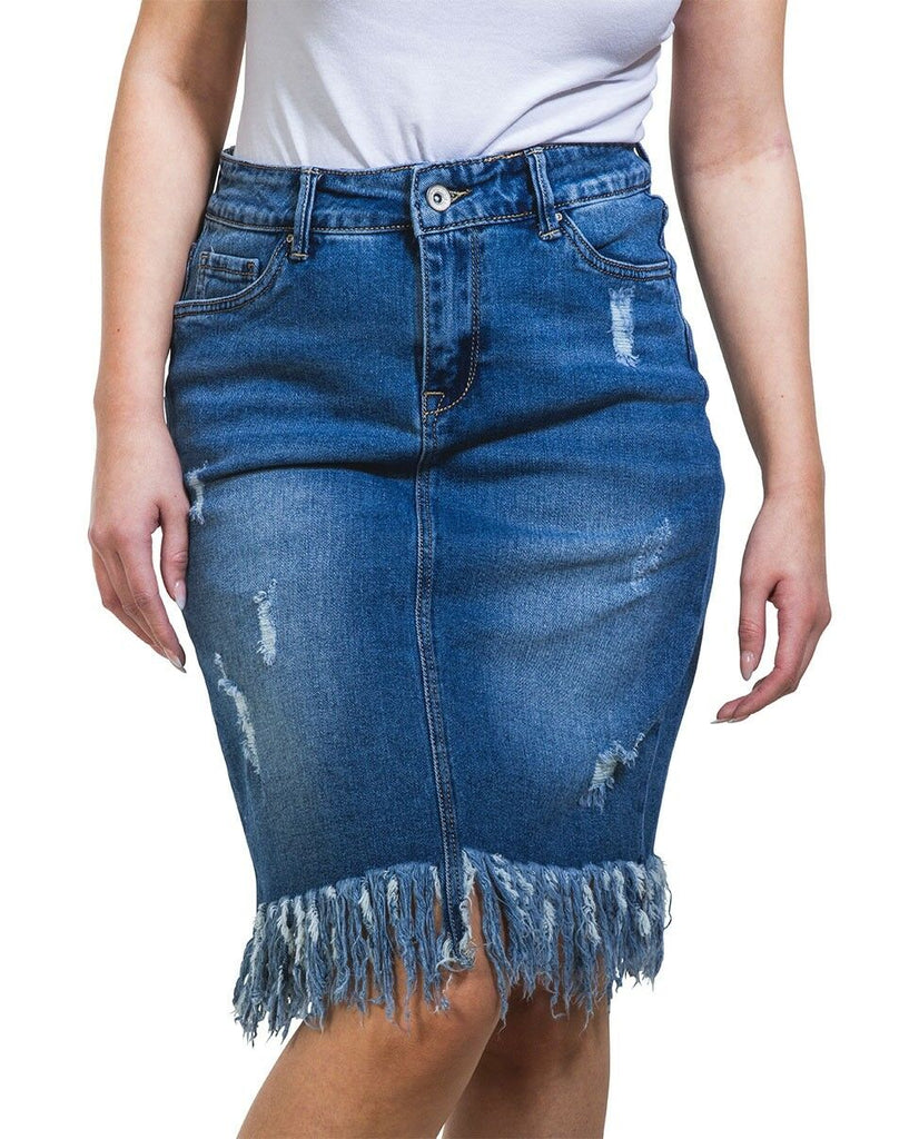 Close-up front view wearing distressed mid-blue denim midi skirt with focus on front pockets, fringe and distressed denim features.