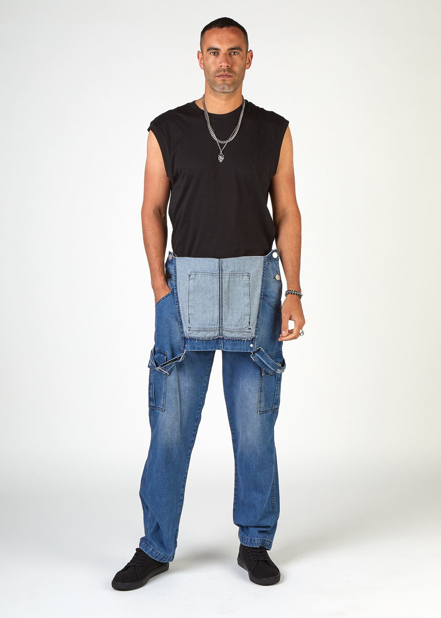 Full frontal bib-down view of loose-fit, stonewash bib-overalls from Dungarees Online, revealing black t-shirt.