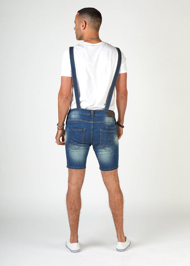 Full-length back view of stylish 'Whitefield' men's denim dungaree shorts with clear view of back pockets and back strap.