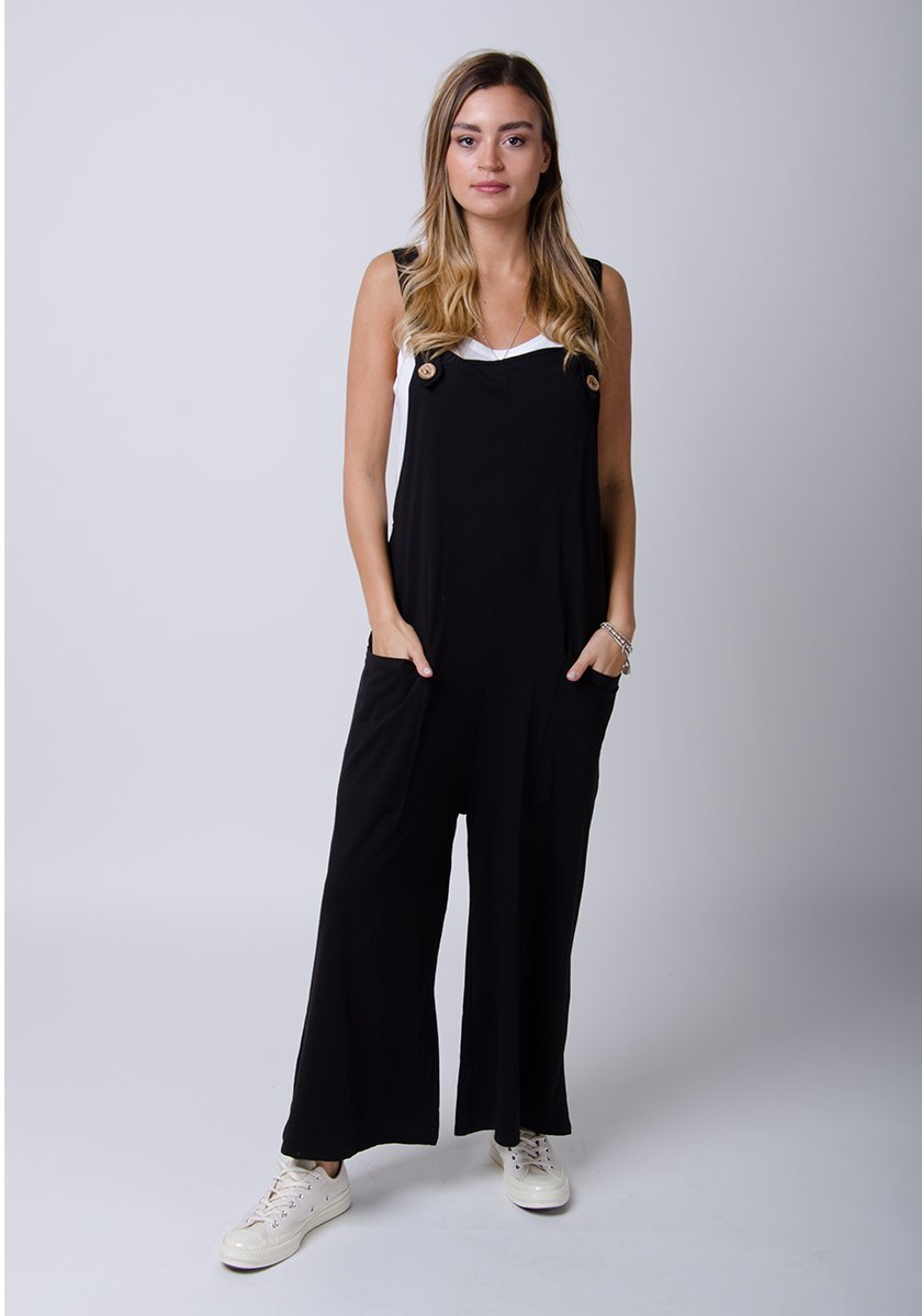 Amber-style, black cotton jersey, wide-leg dungarees. Front, full-length view highlighting functional pockets.