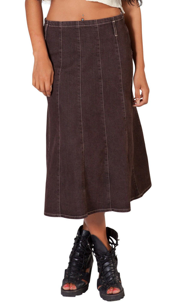 Bottom half of model, wearing calf-length brown skirt.