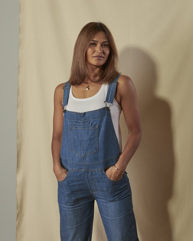 Full-length front shot of Dottie light-wash ladies regular fit dungarees with view of adjustable straps. 