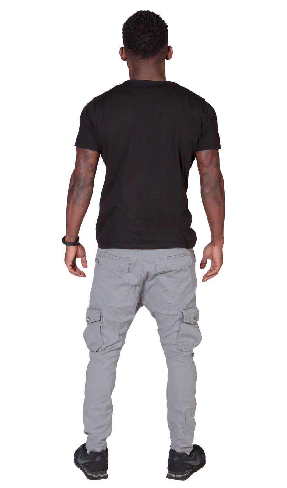 Rear view of ‘Finley’ style, casual cotton mix cargo trousers from Dungarees Online, with view of back pockets and drop crotch styling.