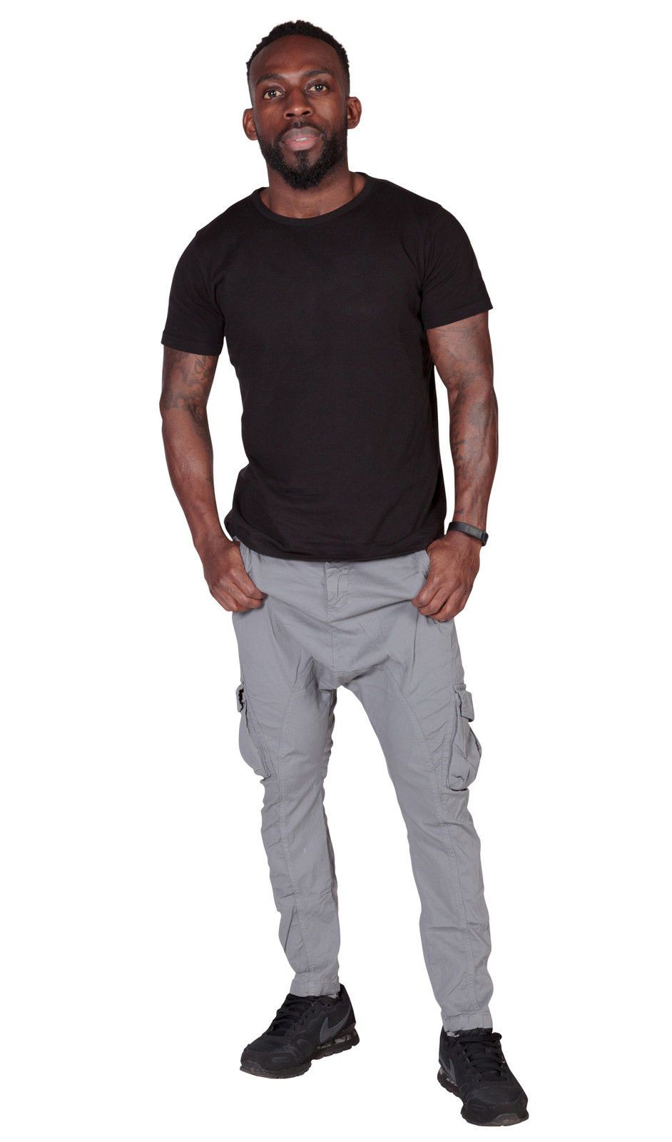 Full frontal view of ‘Finley’ style, casual, slight-stretch cotton cargo trousers in grey with hands in front pockets