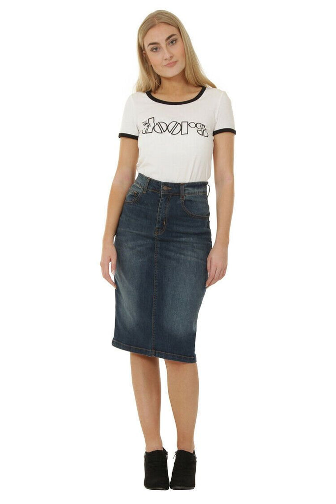 Full frontal wearing classic mid-length stretch denim skirt with clear view of button closure and belt loops.