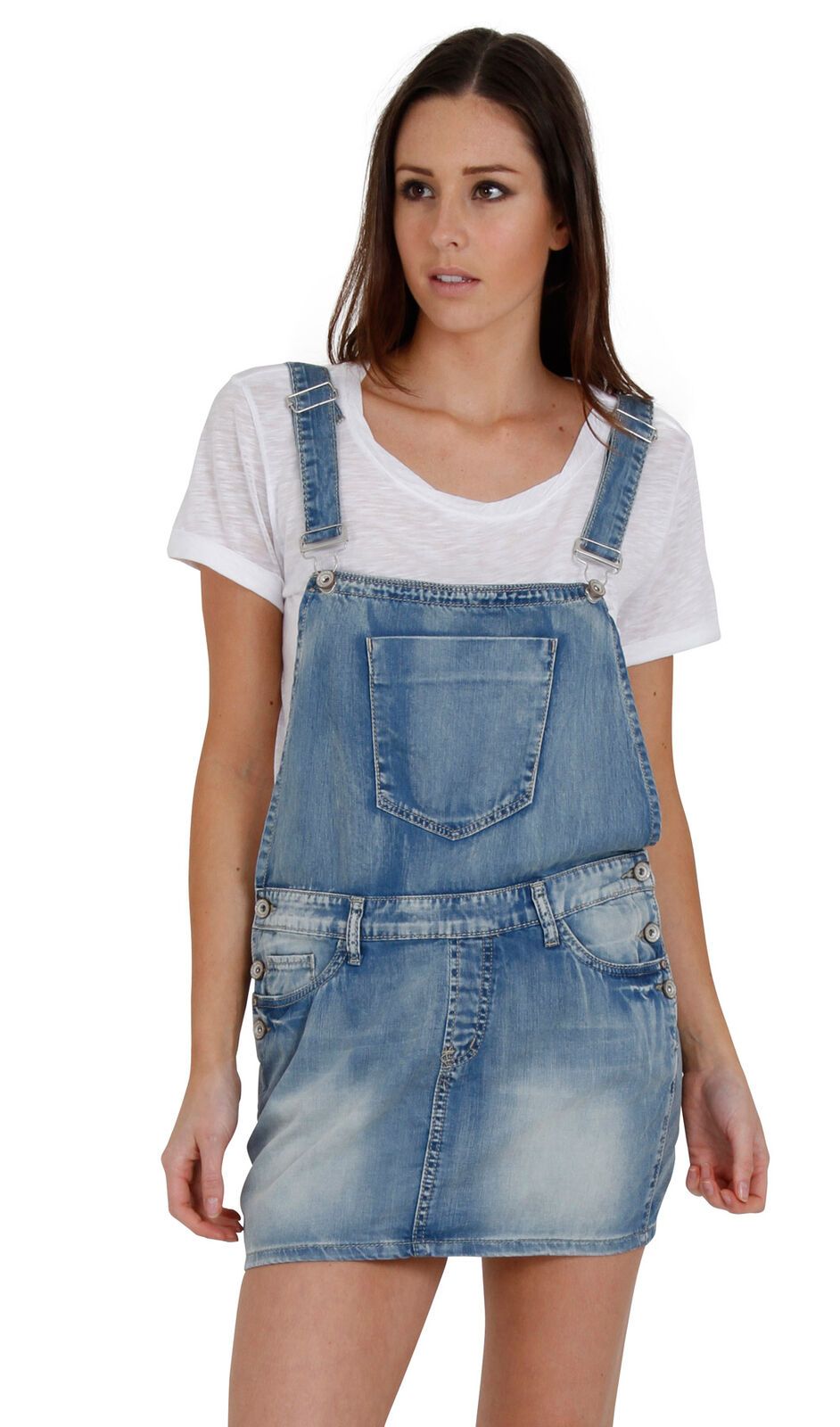 Full-length side view of short, faded pinafore denim dress with clear sight of side button fastening, belt loops and multiple pockets.