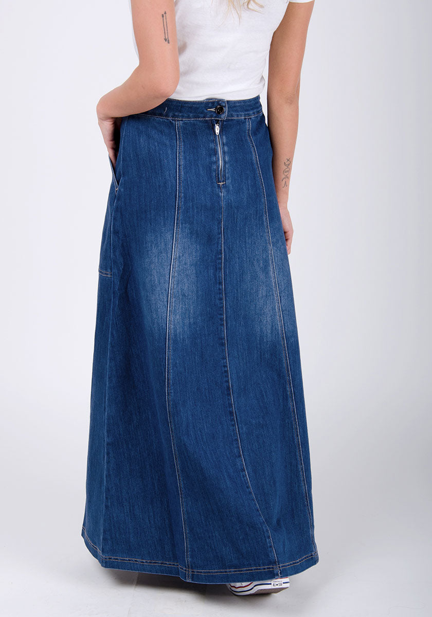 Close-up back view of long denim skirt showing panels and back zip and button fastening.