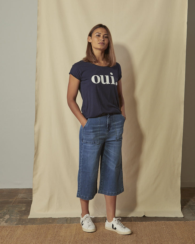 Front view LUCIA organic denim culottes paired with 'Oui' motif t-shirt.