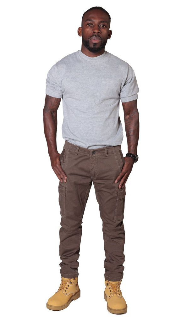 Full frontal view of ‘Pete’ style, casual cotton mix cargo trousers in brown with thumbs in front pockets and view of belt loops and zip fly.