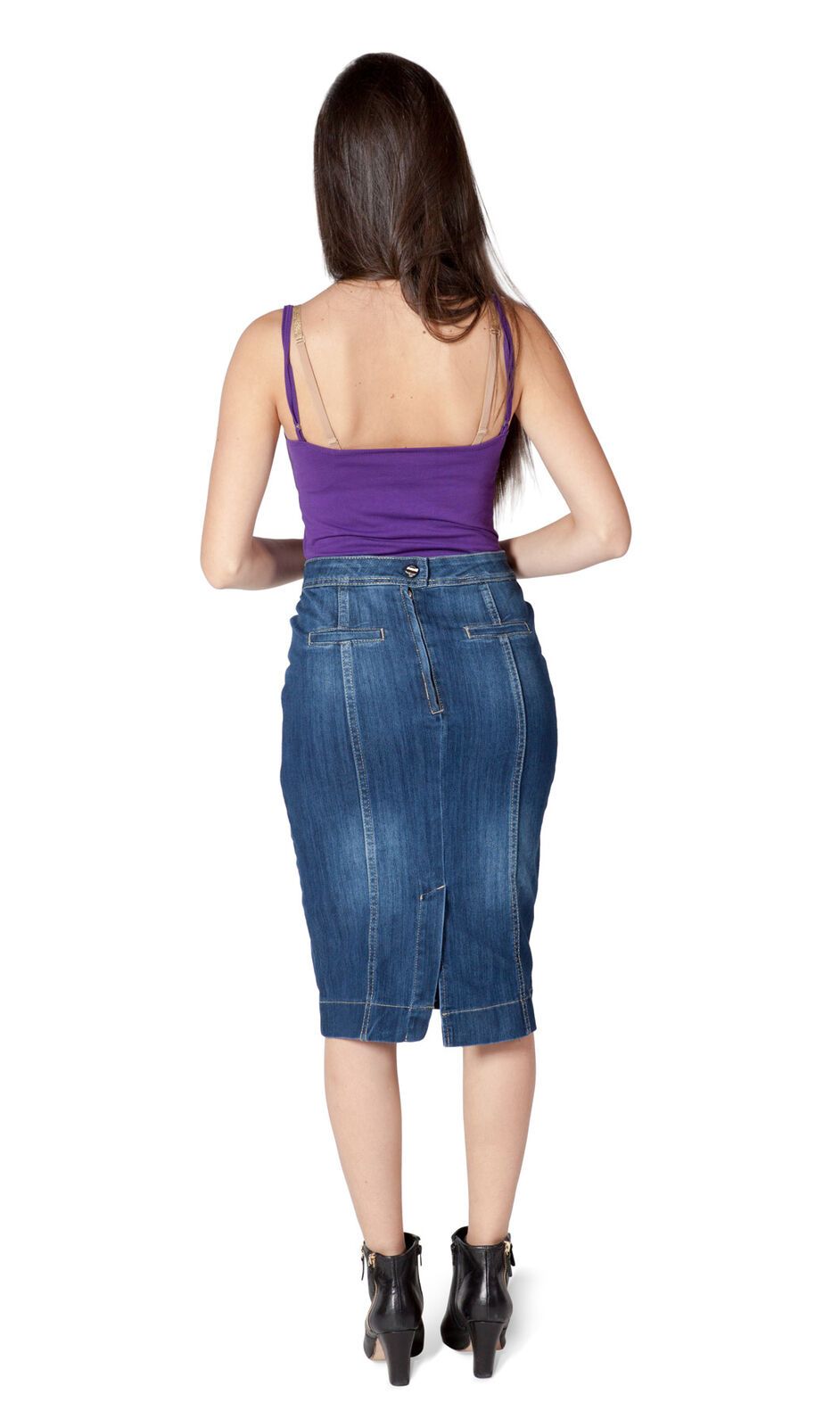 Full-length back view of knee-length, blue denim skirt showing back button and zip.
