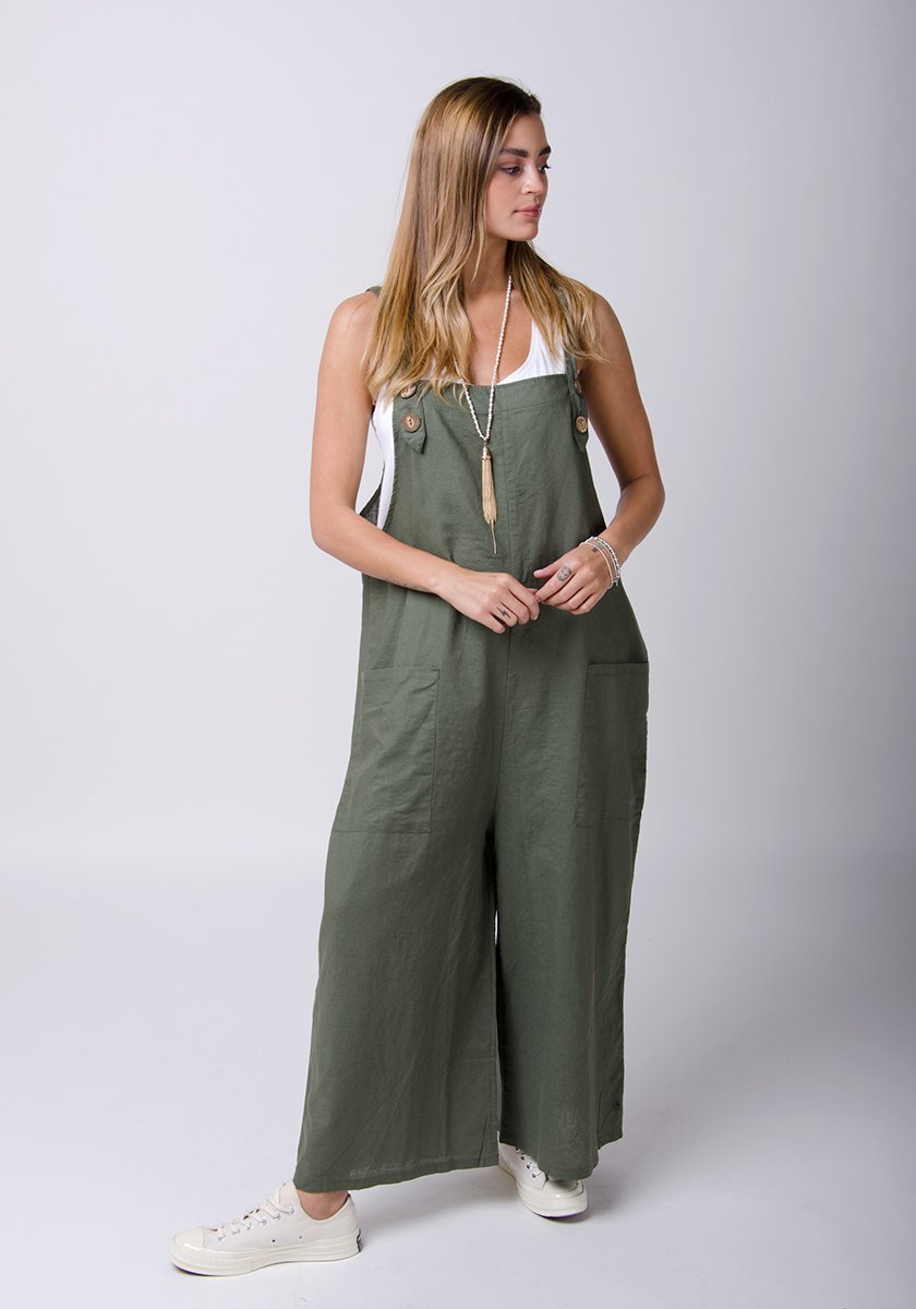 Full front pose wearing WASH Clothing Company's green linen dungarees.