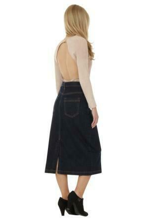 Full angled side view of calf-length, dark denim skirt, showing back split.