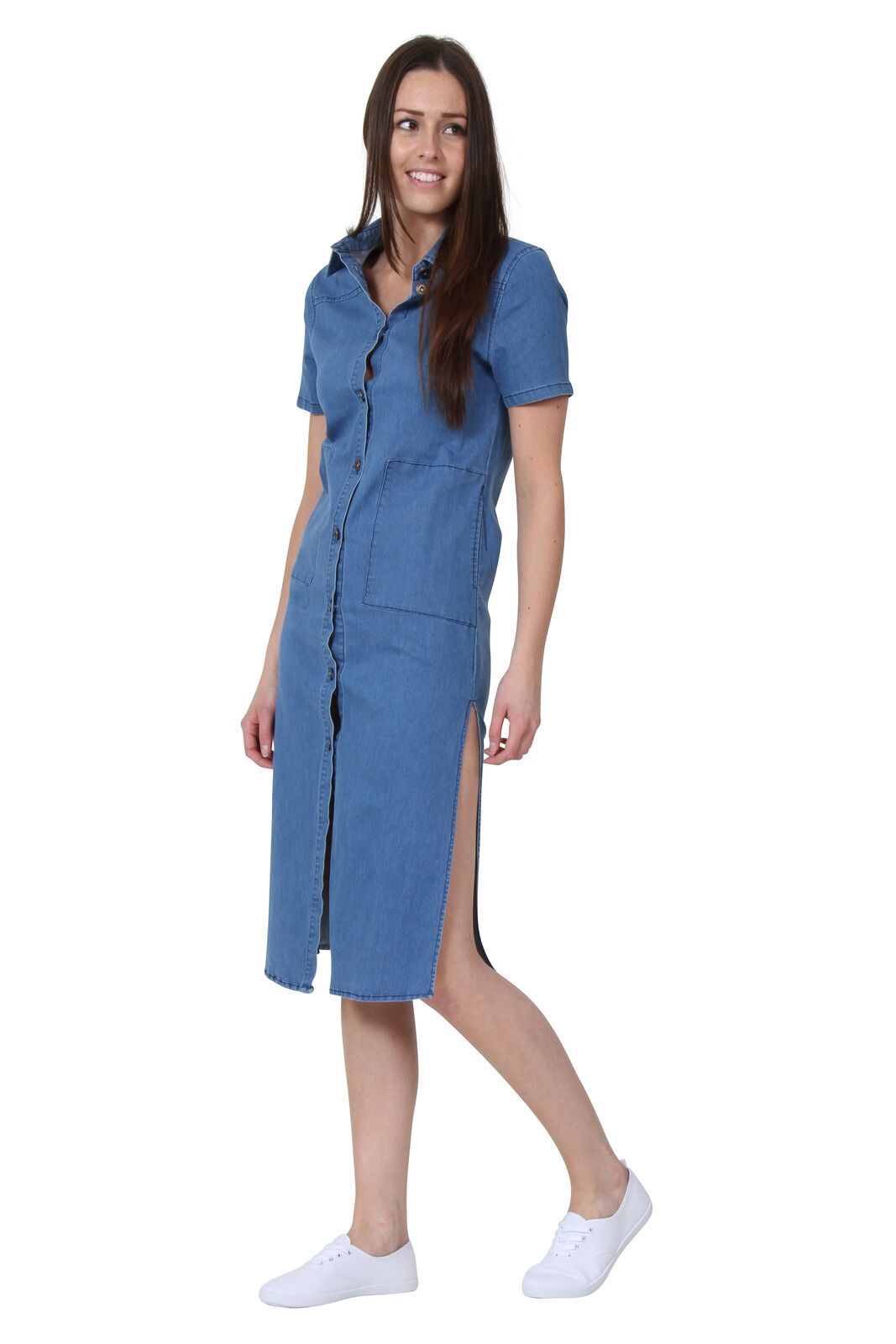 Angled front view of lightweight denim midi dress with view of side split.