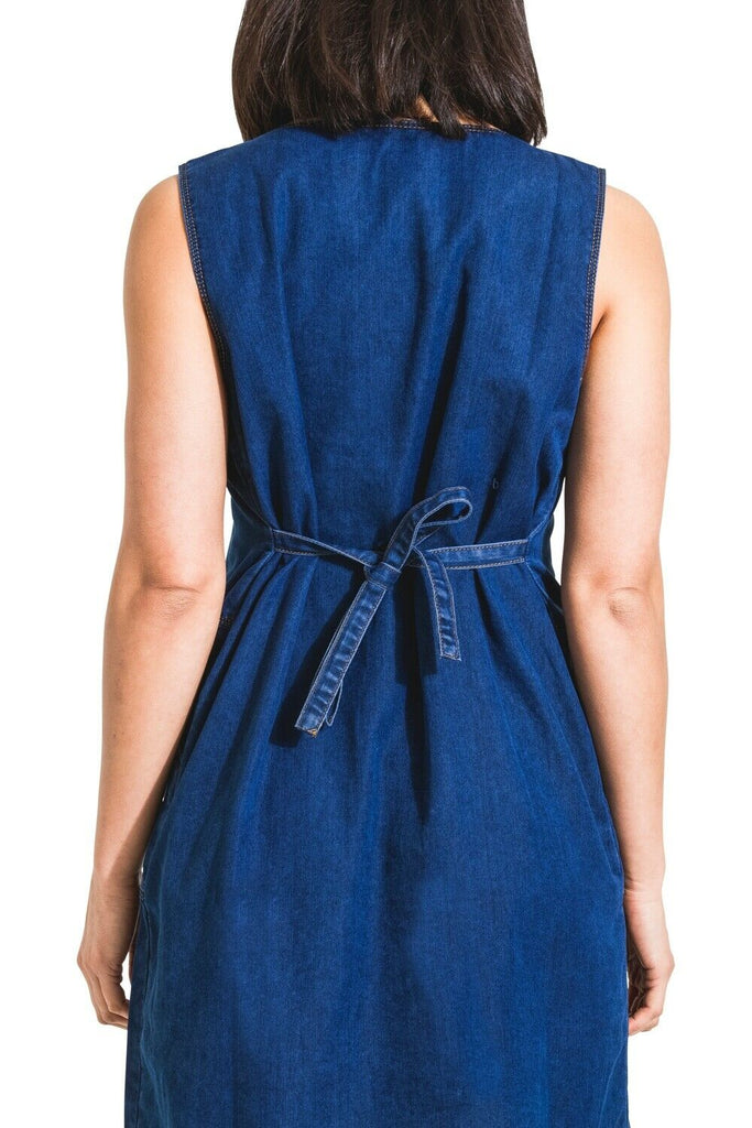 Close-up back view of Tasmin soft denim blue pinafore maternity dress with view of adjustable tie back.