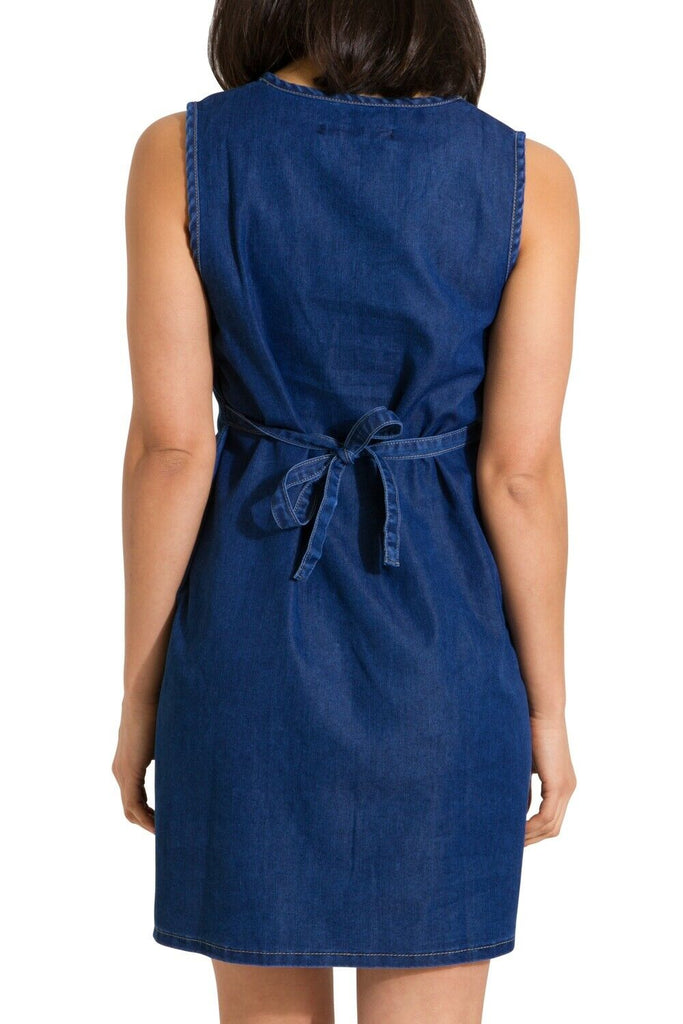 Close-up back view of Thelma soft denim blue pinafore maternity dress with view of adjustable tie back.