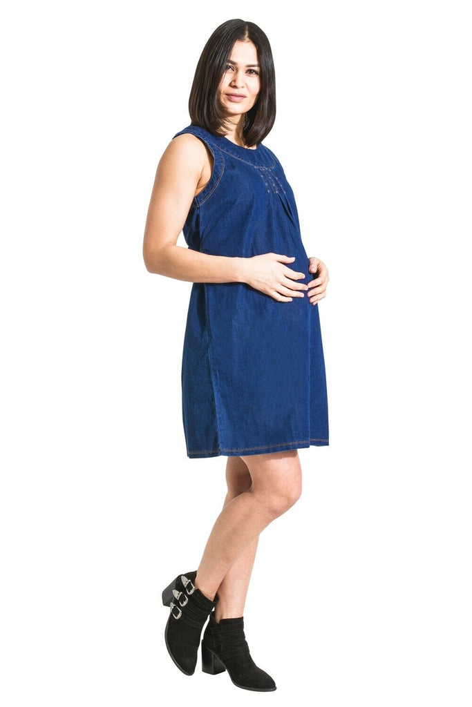 Full-length angled front view of Tina maternity dress demonstrating stretch properties.