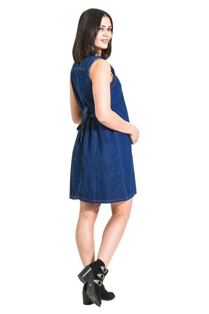 Full-length angled side view of Tina sleeveless denim maternity dress in blue.