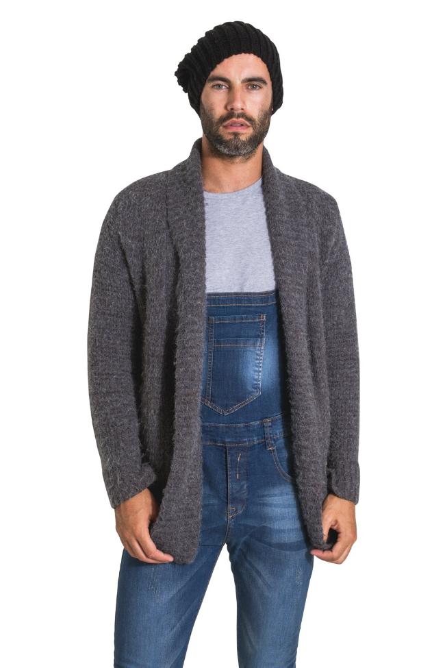 Top two-thirds view of narrow cut distressed denim dungarees paired with grey wool cardigan.